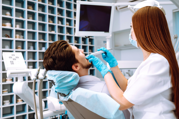 Man getting laser dentistry